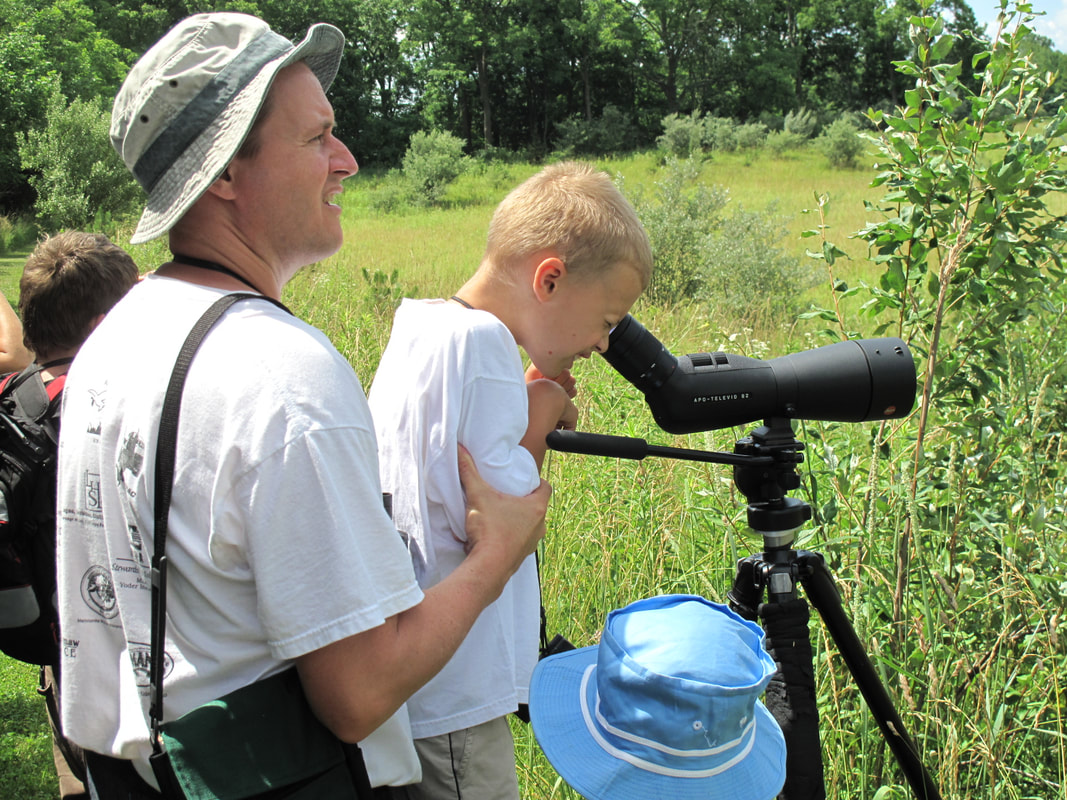 Above: What it's all about: Bringing the community out to see nesting bobolinks and other natural phenomena at Byers Woods, which is designated an Important Birding Area. Photo by Irv Oslin.